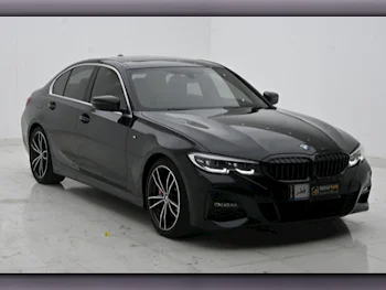 BMW  3-Series  330i  2021  Automatic  33,000 Km  4 Cylinder  Rear Wheel Drive (RWD)  Sedan  Black  With Warranty