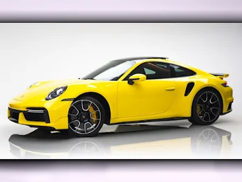 Porsche  911  Turbo S  2023  Automatic  2٬500 Km  6 Cylinder  Four Wheel Drive (4WD)  Coupe / Sport  Yellow  With Warranty
