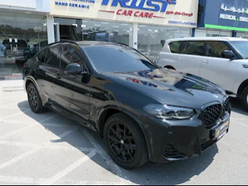 BMW  X-Series  X4 M Competition  2022  Automatic  30,000 Km  4 Cylinder  Four Wheel Drive (4WD)  SUV  Black  With Warranty