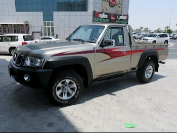 Nissan  Patrol  Pickup  2021  Manual  0 Km  6 Cylinder  Four Wheel Drive (4WD)  Pick Up  Gold  With Warranty