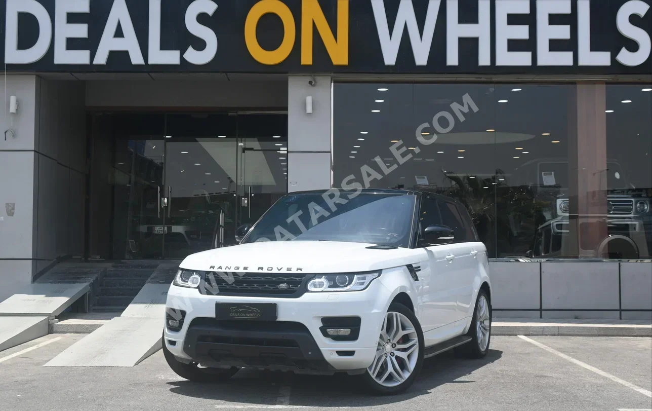 Land Rover  Range Rover  Sport Super charged  2014  Automatic  145,700 Km  8 Cylinder  Four Wheel Drive (4WD)  SUV  White