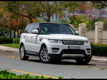 Land Rover  Range Rover  Sport  2014  Automatic  122,000 Km  8 Cylinder  Four Wheel Drive (4WD)  SUV  White