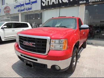 GMC  Sierra  2500 HD  2009  Automatic  209,000 Km  8 Cylinder  Four Wheel Drive (4WD)  Pick Up  Red