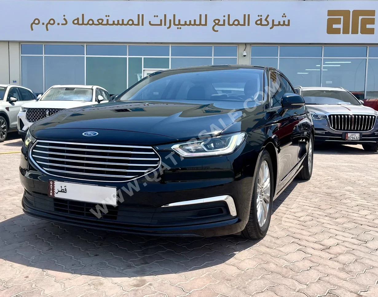 Ford  Taurus  2021  Automatic  58,000 Km  4 Cylinder  Front Wheel Drive (FWD)  Sedan  Black  With Warranty