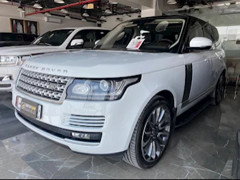 Land Rover  Range Rover  Vogue Super charged  2014  Automatic  142,000 Km  8 Cylinder  Four Wheel Drive (4WD)  SUV  White