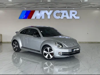 Volkswagen  Beetle  Turbo  2016  Automatic  88,000 Km  4 Cylinder  Front Wheel Drive (FWD)  Hatchback  Silver