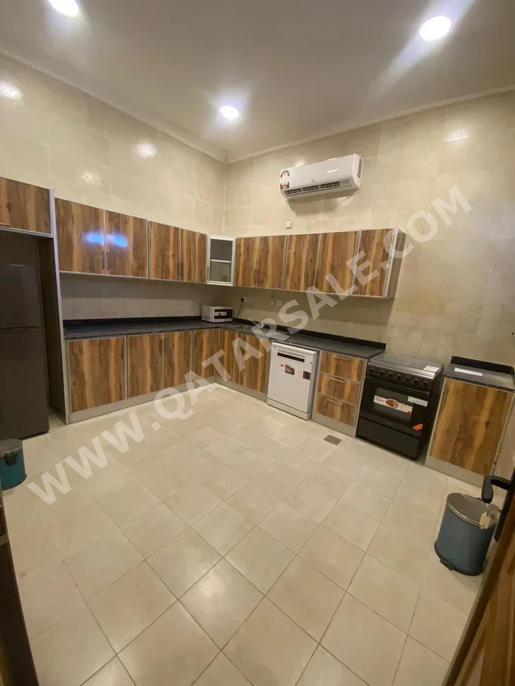 3 Bedrooms  Apartment  For Rent  in Umm Salal -  Umm Al Amad  Fully Furnished