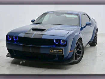 Dodge  Challenger  2021  Automatic  84,000 Km  6 Cylinder  Rear Wheel Drive (RWD)  Coupe / Sport  Blue