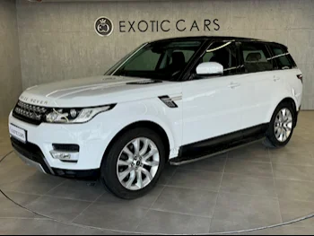Land Rover  Range Rover  Sport HSE  2014  Automatic  74,000 Km  6 Cylinder  Four Wheel Drive (4WD)  SUV  White