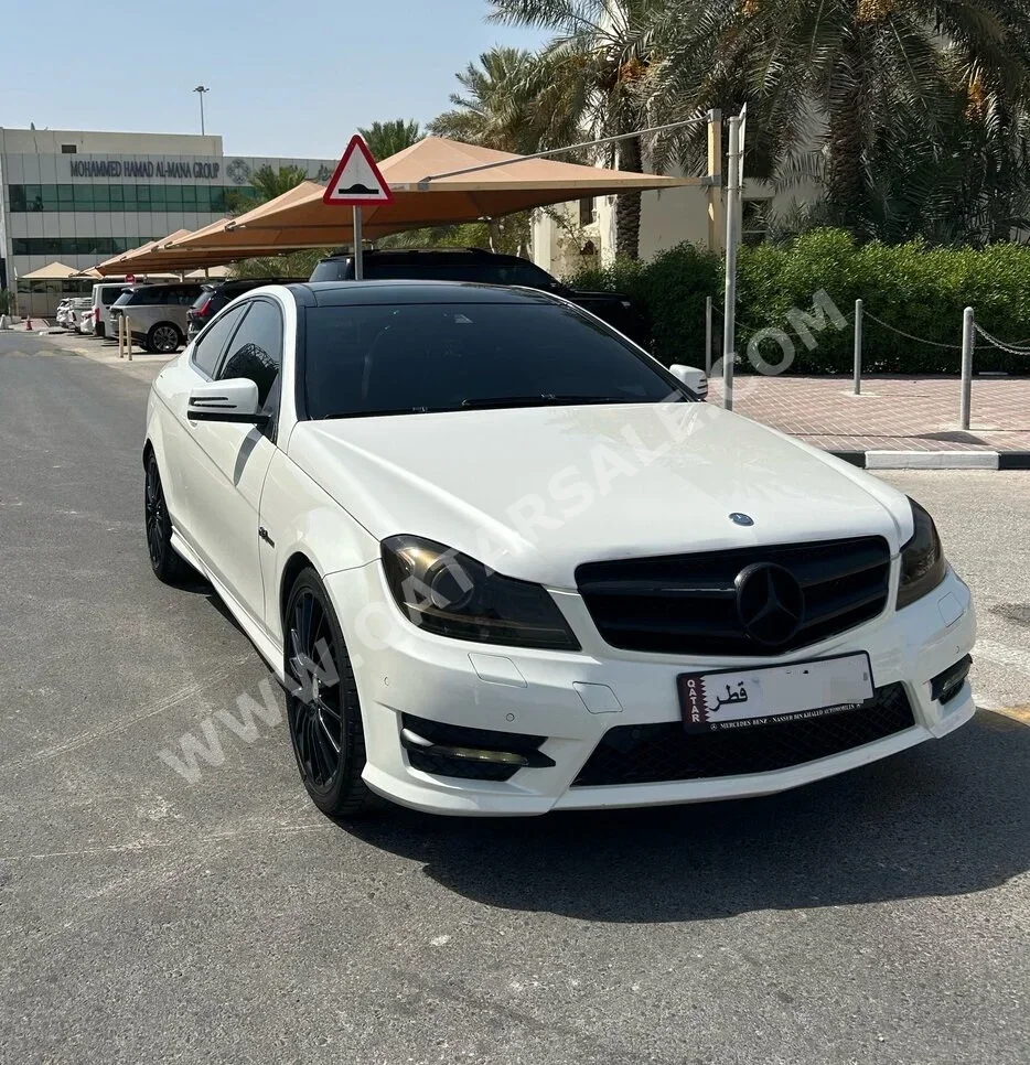 Mercedes-Benz  C-Class  350  2012  Automatic  110,000 Km  6 Cylinder  Rear Wheel Drive (RWD)  Coupe / Sport  White