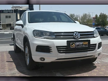 Volkswagen  Touareg  2014  Automatic  142,000 Km  6 Cylinder  All Wheel Drive (AWD)  SUV  White
