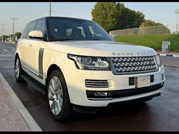  Land Rover  Range Rover  Vogue Super charged  2014  Automatic  159,000 Km  8 Cylinder  Four Wheel Drive (4WD)  SUV  White  With Warranty