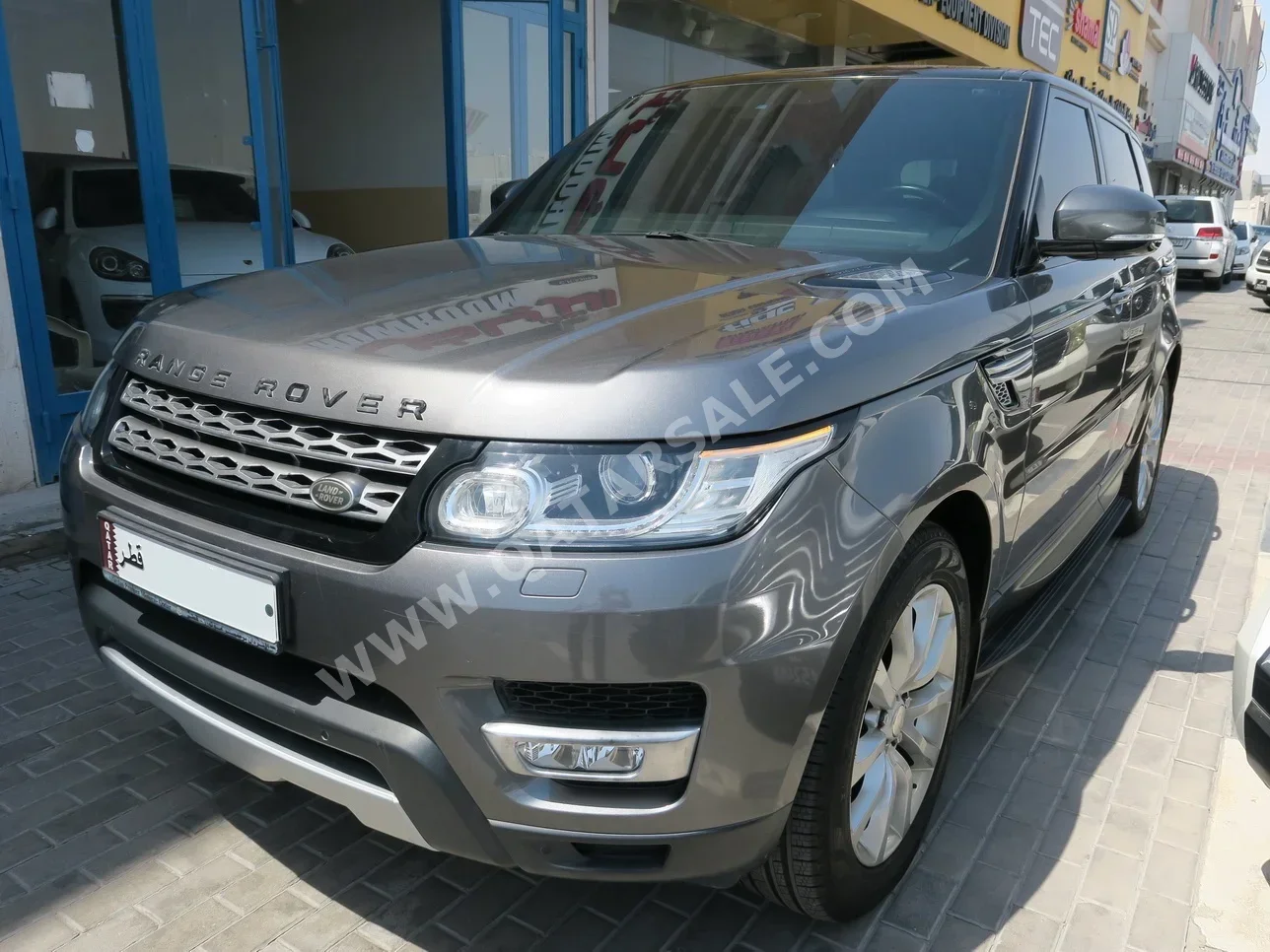 Land Rover  Range Rover  Sport Super charged HST  2014  Automatic  163٬000 Km  8 Cylinder  Four Wheel Drive (4WD)  SUV  Gray