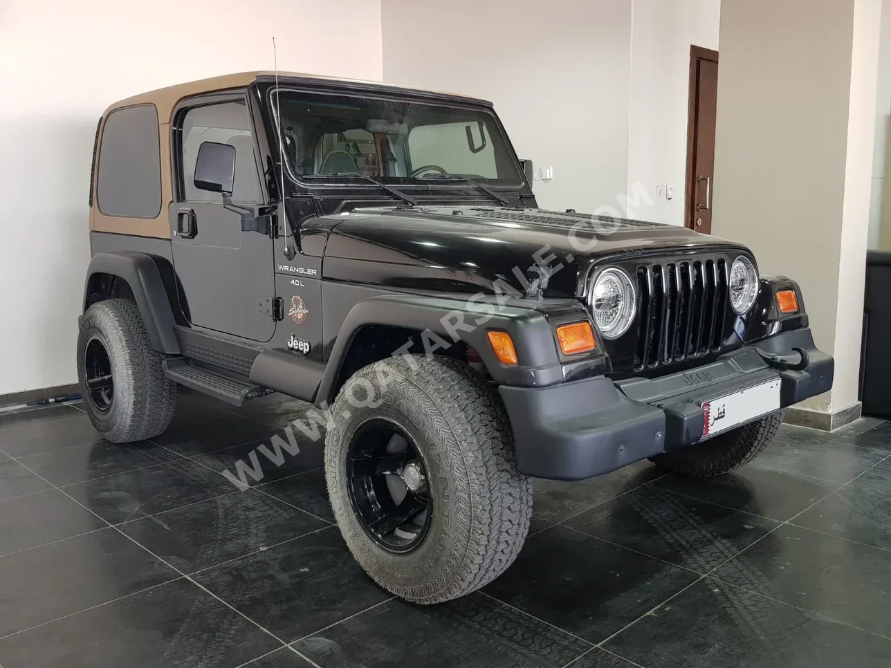 Jeep  Wrangler  1997  Automatic  249,000 Km  6 Cylinder  Four Wheel Drive (4WD)  SUV  Black and Beige