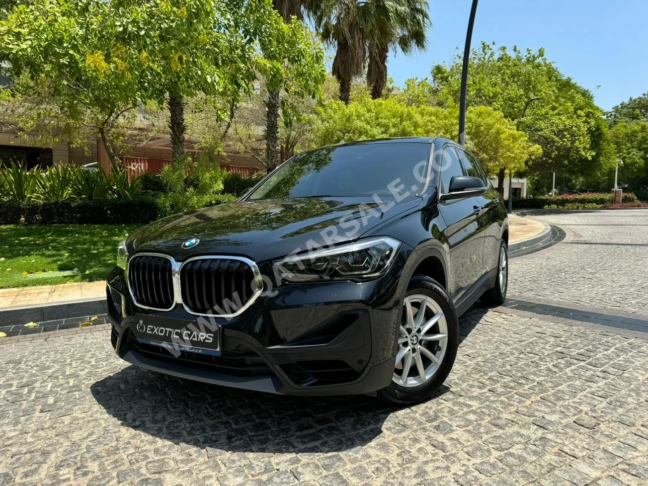 BMW  X-Series  X1  2021  Automatic  49,000 Km  4 Cylinder  Four Wheel Drive (4WD)  SUV  Black  With Warranty