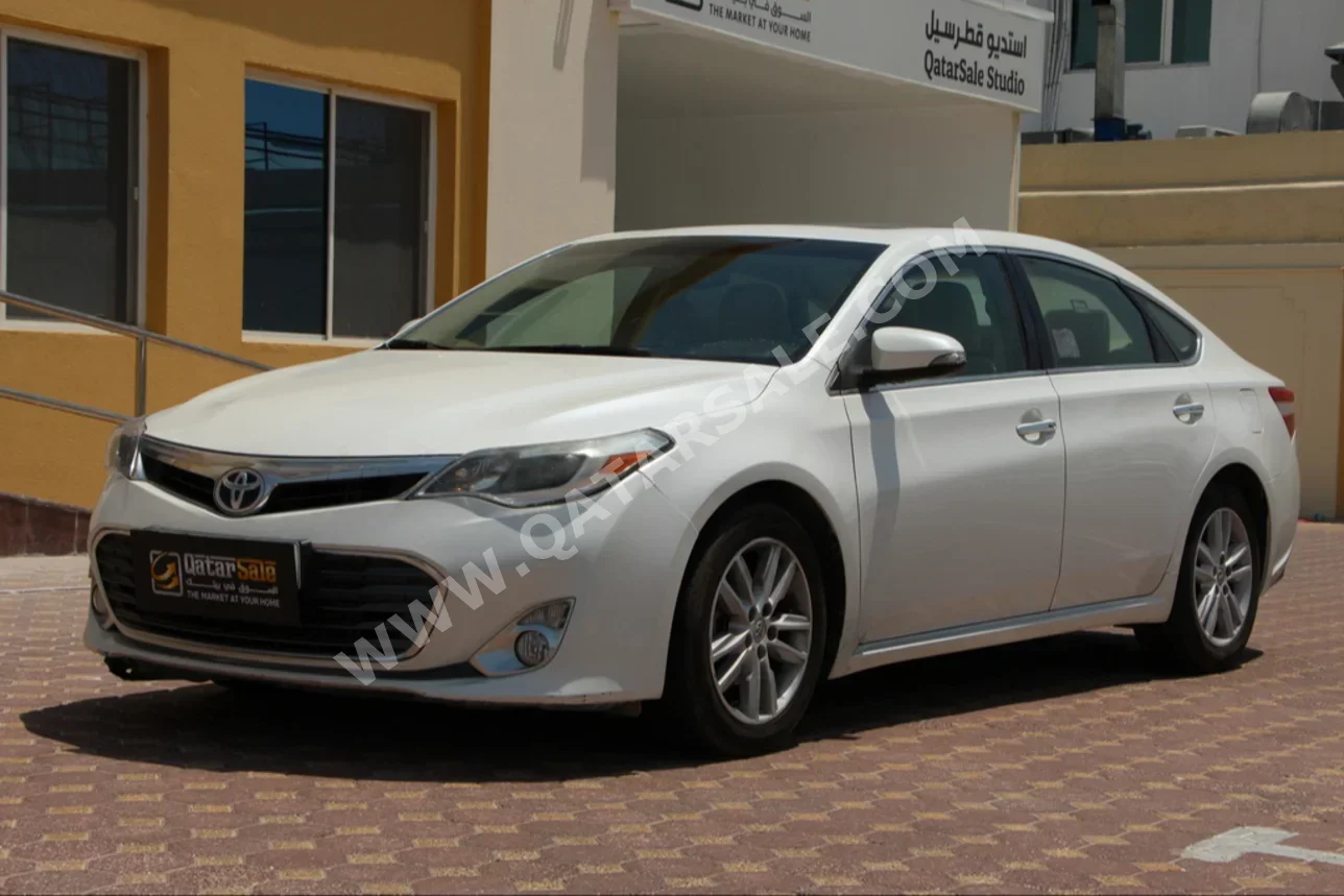 Toyota  Avalon  XLE  2014  Automatic  117,000 Km  6 Cylinder  Front Wheel Drive (FWD)  Sedan  Pearl