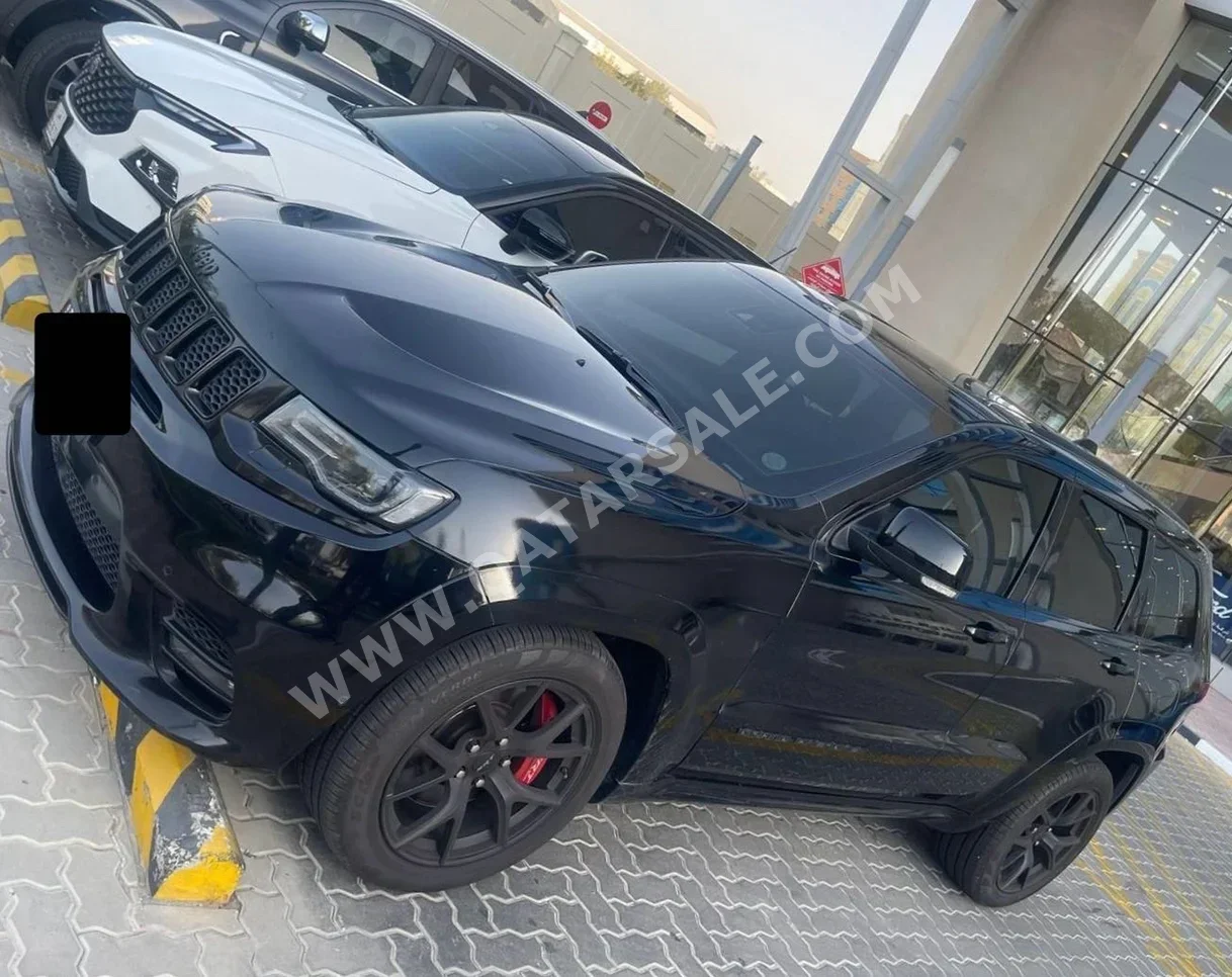 Jeep  Grand Cherokee  SRT-8  2021  Automatic  70,000 Km  8 Cylinder  Four Wheel Drive (4WD)  SUV  Black  With Warranty