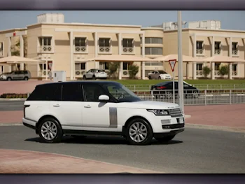Land Rover  Range Rover  Vogue HSE  2013  Automatic  190,000 Km  8 Cylinder  Four Wheel Drive (4WD)  SUV  White
