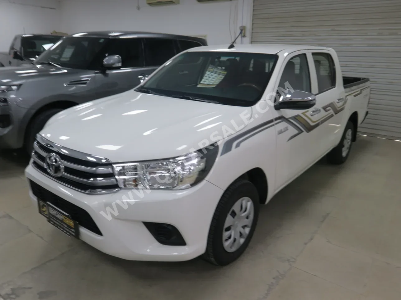 Toyota  Hilux  2018  Manual  64,000 Km  4 Cylinder  Rear Wheel Drive (RWD)  Pick Up  White