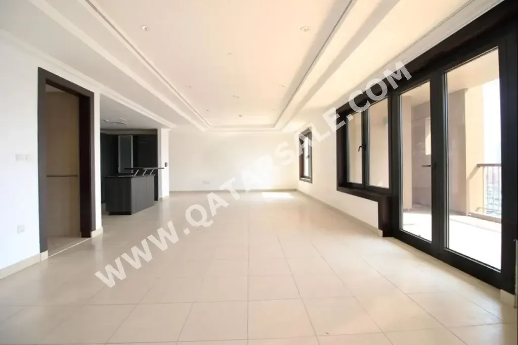 4 Bedrooms  Apartment  For Sale  in Doha -  The Pearl  Semi Furnished
