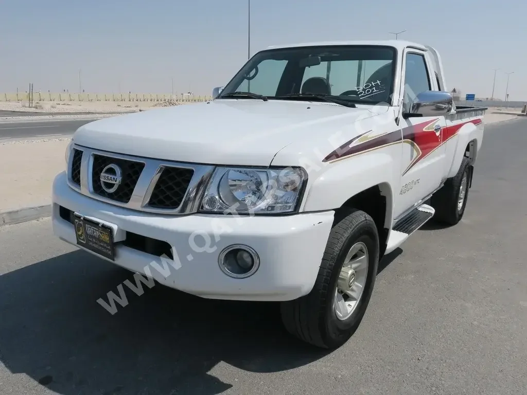 Nissan  Patrol  Pickup  2015  Automatic  165,000 Km  6 Cylinder  Four Wheel Drive (4WD)  Pick Up  White  With Warranty