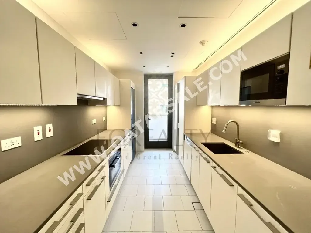 4 Bedrooms  Apartment  For Rent  in Doha -  Mushaireb  Not Furnished