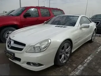 Mercedes-Benz  SL  280  2009  Automatic  12,000 Km  8 Cylinder  Rear Wheel Drive (RWD)  Coupe / Sport  White  With Warranty