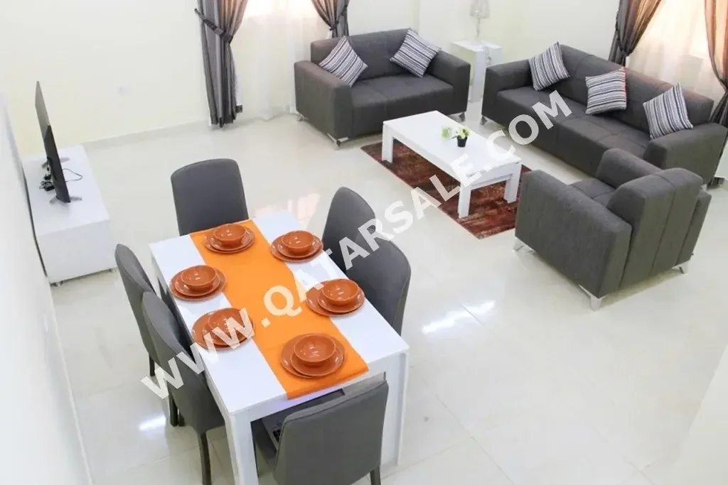 2 Bedrooms  Apartment  For Rent  in Doha -  Al Mansoura  Fully Furnished
