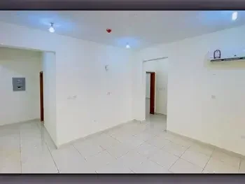 Labour Camp 2 Bedrooms  Apartment  For Rent  in Doha -  Al Sadd  Not Furnished
